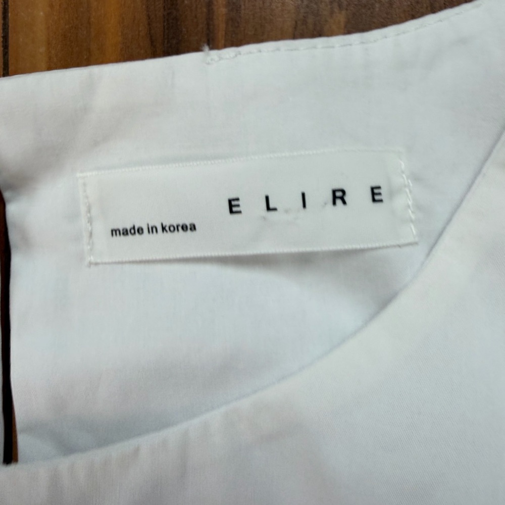 ELIRE White Ruffle Sleeve Peplum Top - Picture 7 of 9